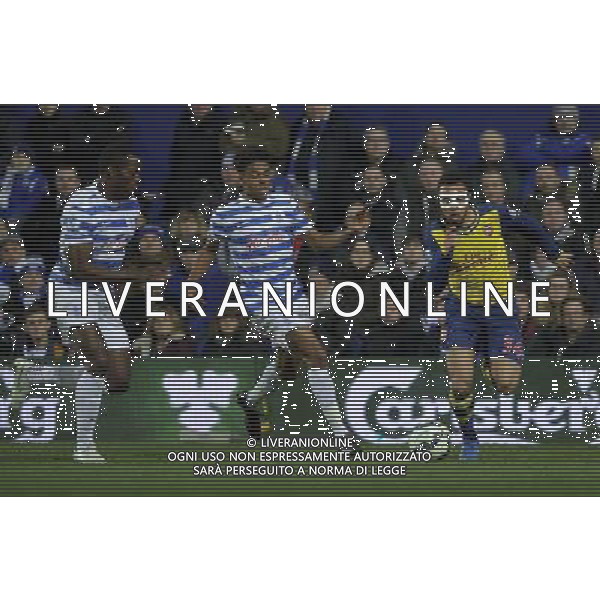 Arsenal\'s Francis Coquelin battles for possession with Queens Park Rangers\' Darnell Furlong Photographer Ashley Western/CameraSport Football - Barclays Premiership - Queens Park Rangers v Arsenal - Wednesday 4th March 2015 - Loftus Road - London © CameraSport - 43 Linden Ave. Countesthorpe. Leicester. England. LE8 5PG - Tel: +44 (0) 116 277 4147 - admin@camerasport.com - www.camerasport.com /Agenzia Aldo Liverani sas - ITALY ONLY - EDITORIAL USE ONLY