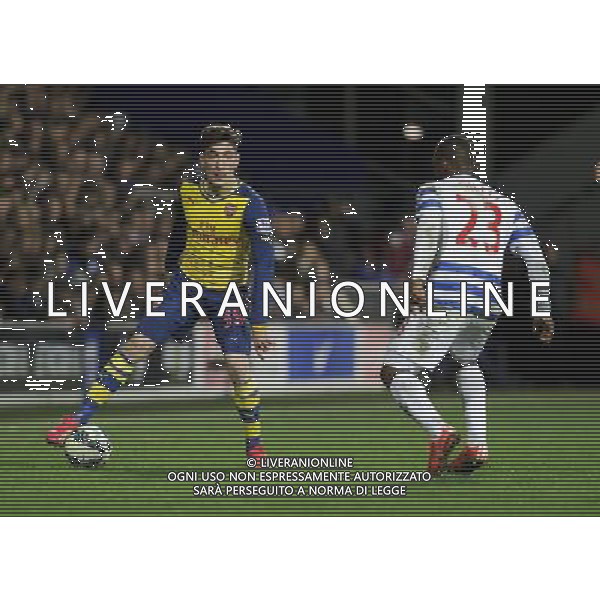 Arsenal\'s Hector Bellerin shields the ball from Queens Park Rangers\' David Hoilett Photographer Ashley Western/CameraSport Football - Barclays Premiership - Queens Park Rangers v Arsenal - Wednesday 4th March 2015 - Loftus Road - London © CameraSport - 43 Linden Ave. Countesthorpe. Leicester. England. LE8 5PG - Tel: +44 (0) 116 277 4147 - admin@camerasport.com - www.camerasport.com /Agenzia Aldo Liverani sas - ITALY ONLY - EDITORIAL USE ONLY