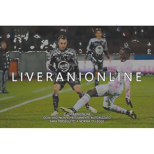 Romain PHILIPPOTEAUX / Pape Amodou SOUGOU - 04.03.2015 - Evian Thonon / Lorient - Match en retard de la 26eme journee de Ligue 1 Photo : Jean Paul Thomas / Icon Sport /Agenzia Aldo Liverani sas - ITALY ONLY - EDITORIAL USE ONLY