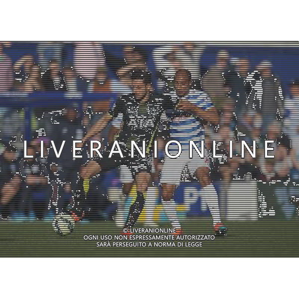 Tottenham Hotspur\'s Nacer Chadli (L) and Queens Park Rangers\' Karl Henry in action during todays match Photographer Jack Phillips/CameraSport Football - Barclays Premiership - Queens Park Rangers v Tottenham Hotspur - Saturday 7th March 2015 - Loftus Road - London © CameraSport - 43 Linden Ave. Countesthorpe. Leicester. England. LE8 5PG - Tel: +44 (0) 116 277 4147 - admin@camerasport.com - www.camerasport.com /Agenzia Aldo Liverani sas - ITALY ONLY - EDITORIAL USE ONLY