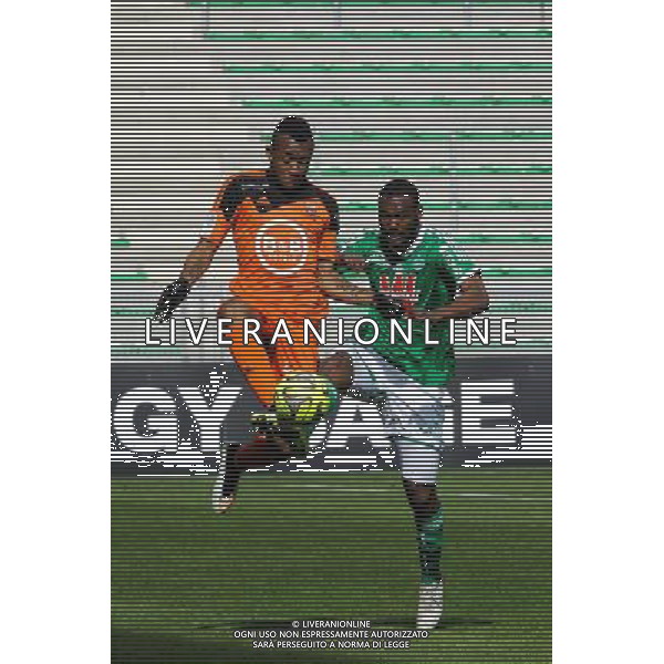 Jordan AYEW / Landry N GUEMO - 08.03.2015 - Saint Etienne / Lorient - 28eme journee de Ligue 1 Photo : Jean Paul Thomas / Icon Sport AG ALDO LIVERANI SAS ONLY ITALY