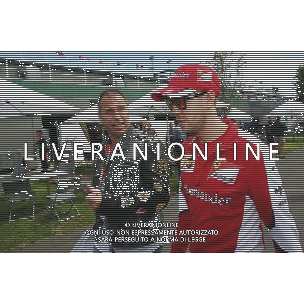 (L to R): Kai Ebel (GER) RTL TV Presenter with Sebastian Vettel (GER) Ferrari. 12.03.2015. Formula 1 World Championship, Rd 1, Australian Grand Prix, Albert Park, Melbourne, Australia, Preparation Day. AG ALDO LIVERANI SAS ONLY ITALY