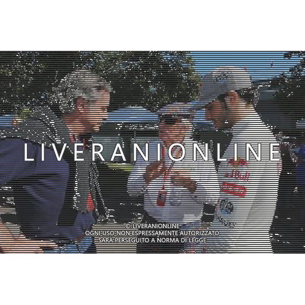 (L to R): Carlos Sainz (ESP) with Jackie Stewart (GBR) and Carlos Sainz Jr (ESP) Scuderia Toro Rosso. 13.03.2015. Formula 1 World Championship, Rd 1, Australian Grand Prix, Albert Park, Melbourne, Australia, Practice Day. AG ALDO LIVERANI SAS ONLY ITALY