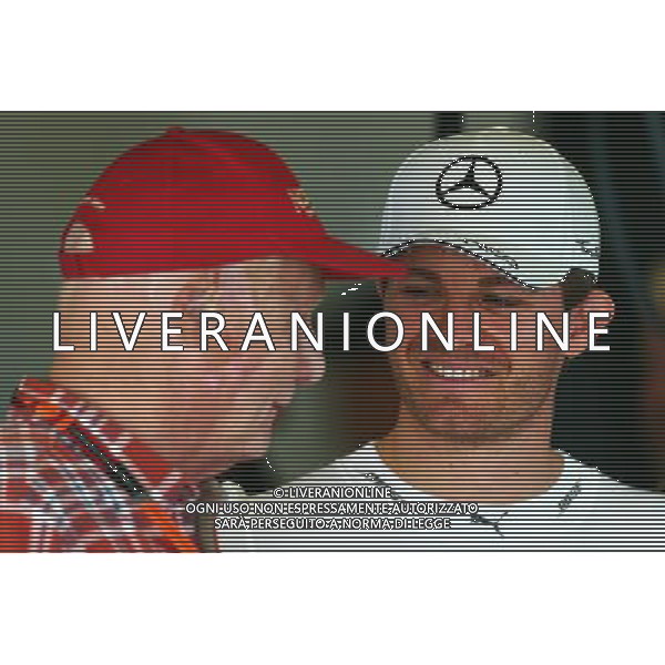 (L to R): Niki Lauda (AUT) Mercedes Non-Executive Chairman with Nico Rosberg (GER) Mercedes AMG F1. 14.03.2015. Formula 1 World Championship, Rd 1, Australian Grand Prix, Albert Park, Melbourne, Australia, Qualifying Day. AG ALDO LIVERANI SAS ONLY ITALY