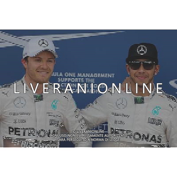 Nico Rosberg (GER), Mercedes AMG F1 Team and Lewis Hamilton (GBR), Mercedes AMG F1 Team 14.03.2015. Formula 1 World Championship, Rd 1, Australian Grand Prix, Albert Park, Melbourne, Australia, Qualifying Day. AG ALDO LIVERANI SAS ONLY ITALY