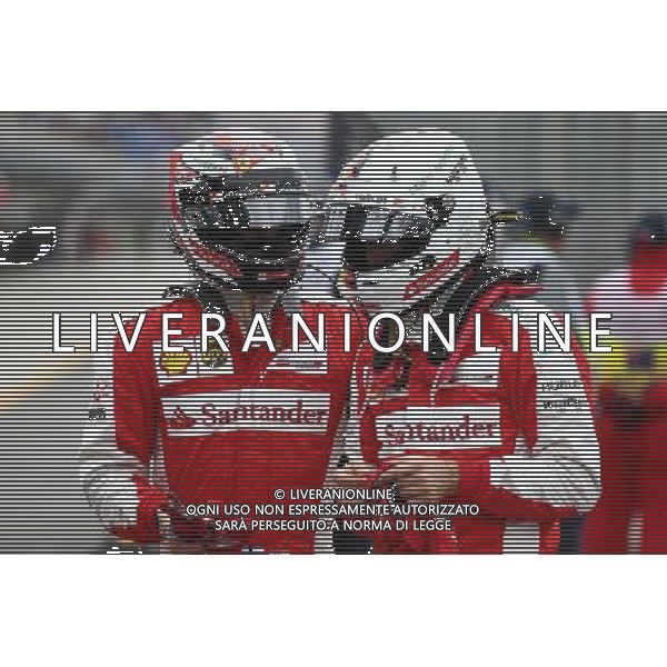 Sebastian Vettel (GER) Ferrari SF15-T and Kimi Raikkonen (FIN) Ferrari. 14.03.2015. Formula 1 World Championship, Rd 1, Australian Grand Prix, Albert Park, Melbourne, Australia, Qualifying Day. AG ALDO LIVERANI SAS ONLY ITALY