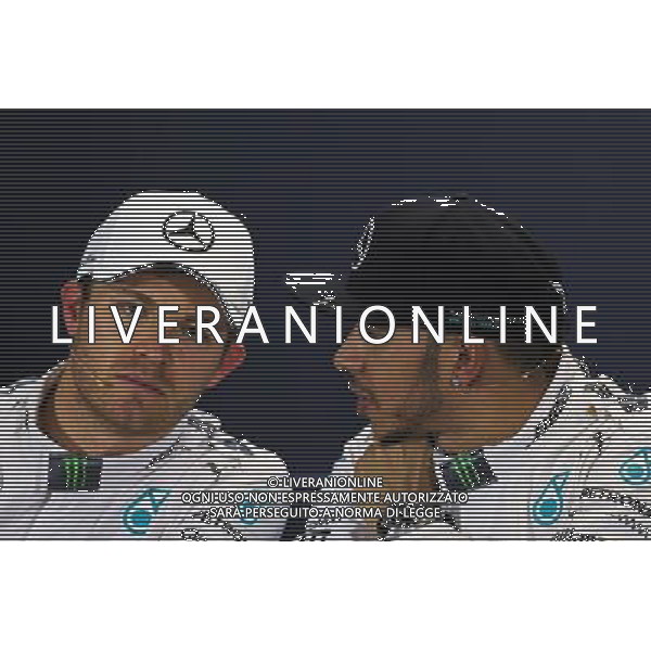 (L to R): Nico Rosberg (GER) Mercedes AMG F1 with team mate Lewis Hamilton (GBR) Mercedes AMG F1 in the FIA Press Conference. 14.03.2015. Formula 1 World Championship, Rd 1, Australian Grand Prix, Albert Park, Melbourne, Australia, Qualifying Day. AG ALDO LIVERANI SAS ONLY ITALY