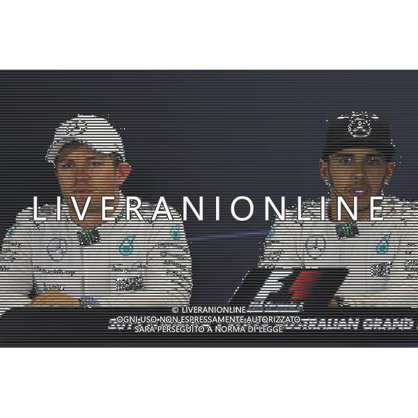 (L to R): Nico Rosberg (GER) Mercedes AMG F1 with team mate Lewis Hamilton (GBR) Mercedes AMG F1 in the FIA Press Conference. 14.03.2015. Formula 1 World Championship, Rd 1, Australian Grand Prix, Albert Park, Melbourne, Australia, Qualifying Day. AG ALDO LIVERANI SAS ONLY ITALY