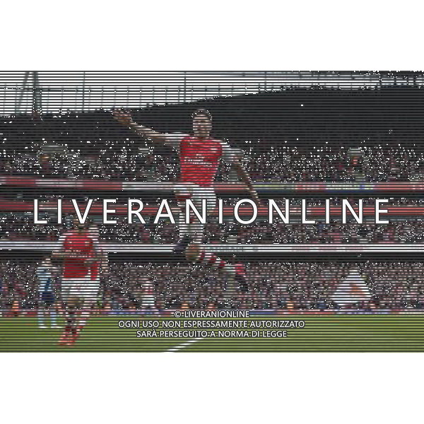 Arsenal\'s Olivier Giroud celebrates scoring his sides first goal Photographer Craig Mercer/CameraSport Football - Barclays Premiership - Arsenal v West Ham United - Saturday 14th March 2015 - Emirates Stadium - London © CameraSport - 43 Linden Ave. Countesthorpe. Leicester. England. LE8 5PG - Tel: +44 (0) 116 277 4147 - admin@camerasport.com - www.camerasport.com AG ALDO LIVERANI SAS ONLY ITALY