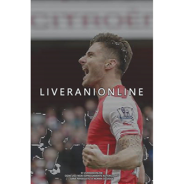 Arsenal\'s Olivier Giroud celebrates scoring his sides first goal Photographer Craig Mercer/CameraSport Football - Barclays Premiership - Arsenal v West Ham United - Saturday 14th March 2015 - Emirates Stadium - London © CameraSport - 43 Linden Ave. Countesthorpe. Leicester. England. LE8 5PG - Tel: +44 (0) 116 277 4147 - admin@camerasport.com - www.camerasport.com AG ALDO LIVERANI SAS ONLY ITALY