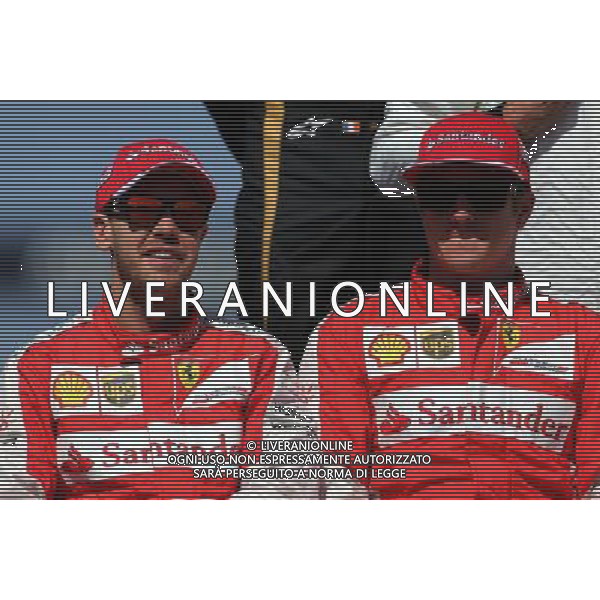 Sebastian Vettel (GER), Scuderia Ferrari and Kimi Raikkonen (FIN), Scuderia Ferrari 15.03.2015. Formula 1 World Championship, Rd 1, Australian Grand Prix, Albert Park, Melbourne, Australia, Race Day. AG ALDO LIVERANI SAS ONLY ITALY