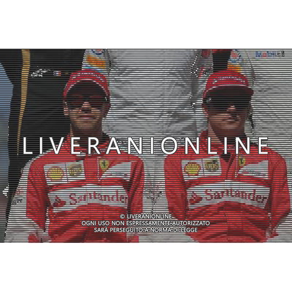 Kimi Raikkonen (FIN), Scuderia Ferrari and Sebastian Vettel (GER), Scuderia Ferrari 15.03.2015. Formula 1 World Championship, Rd 1, Australian Grand Prix, Albert Park, Melbourne, Australia, Race Day. AG ALDO LIVERANI SAS ONLY ITALY