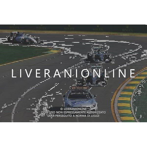 Lewis Hamilton (GBR) Mercedes AMG F1 W06 leads behind the FIA Safety Car. 15.03.2015. Formula 1 World Championship, Rd 1, Australian Grand Prix, Albert Park, Melbourne, Australia, Race Day. AG ALDO LIVERANI SAS ONLY ITALY