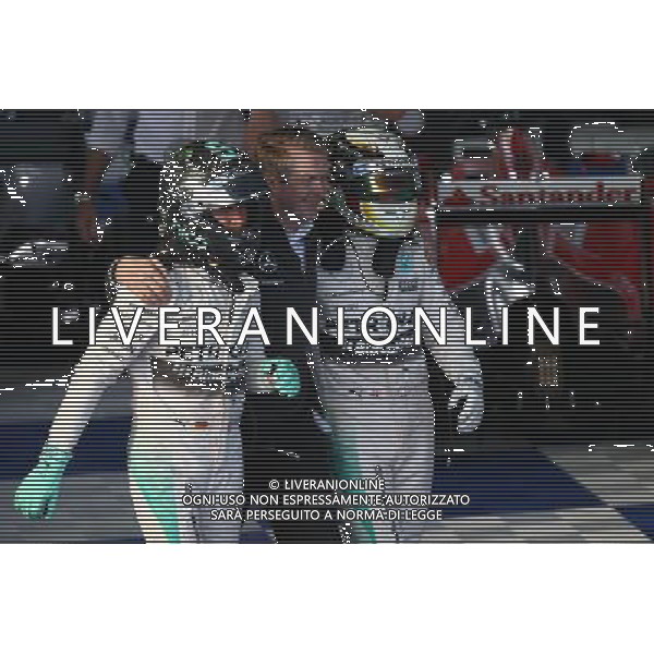 Nico Rosberg (GER) Mercedes AMG F1 W06 and Lewis Hamilton (GBR) Mercedes AMG F1. 15.03.2015. Formula 1 World Championship, Rd 1, Australian Grand Prix, Albert Park, Melbourne, Australia, Race Day. AG ALDO LIVERANI SAS ONLY ITALY