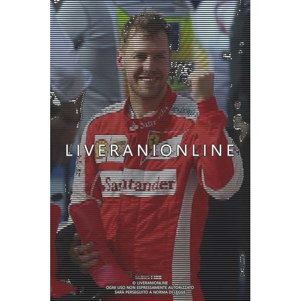 3rd place Sebastian Vettel (GER) Ferrari. 15.03.2015. Formula 1 World Championship, Rd 1, Australian Grand Prix, Albert Park, Melbourne, Australia, Race Day. AG ALDO LIVERANI SAS ONLY ITALY