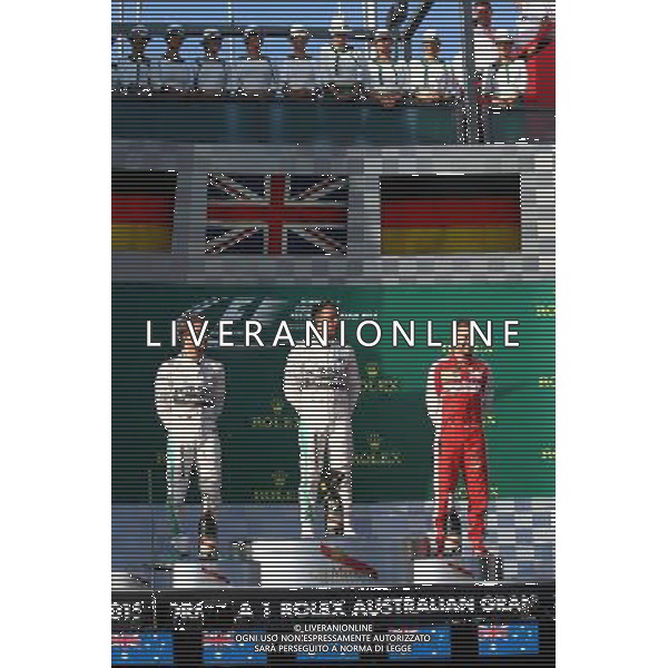 1st place Lewis Hamilton (GBR) Mercedes AMG F1, 2nd place Nico Rosberg (GER) Mercedes AMG F1 W06 and 3rd place Sebastian Vettel (GER) Ferrari. 15.03.2015. Formula 1 World Championship, Rd 1, Australian Grand Prix, Albert Park, Melbourne, Australia, Race Day. AG ALDO LIVERANI SAS ONLY ITALY