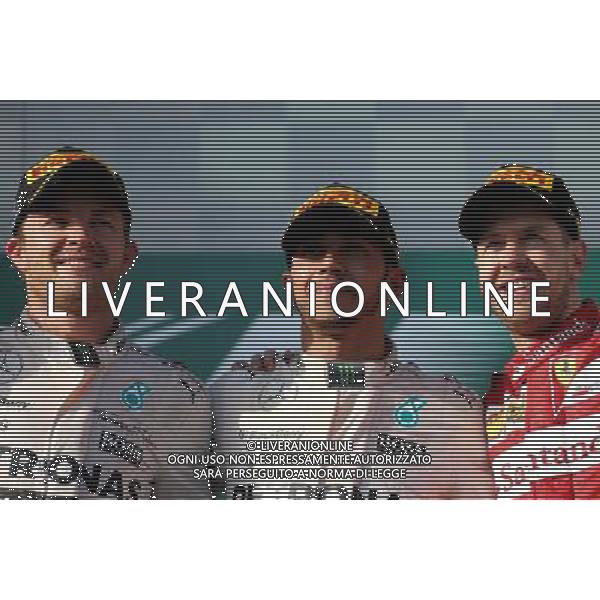 Nico Rosberg (GER), Mercedes AMG F1 Team, Lewis Hamilton (GBR), Mercedes AMG F1 Team and Sebastian Vettel (GER), Scuderia Ferrari 15.03.2015. Formula 1 World Championship, Rd 1, Australian Grand Prix, Albert Park, Melbourne, Australia, Race Day. AG ALDO LIVERANI SAS ONLY ITALY