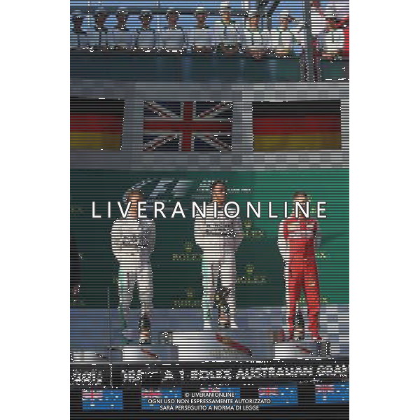 1st place Lewis Hamilton (GBR) Mercedes AMG F1, 2nd place Nico Rosberg (GER) Mercedes AMG F1 W06 and 3rd place Sebastian Vettel (GER) Ferrari. 15.03.2015. Formula 1 World Championship, Rd 1, Australian Grand Prix, Albert Park, Melbourne, Australia, Race Day. AG ALDO LIVERANI SAS ONLY ITALY