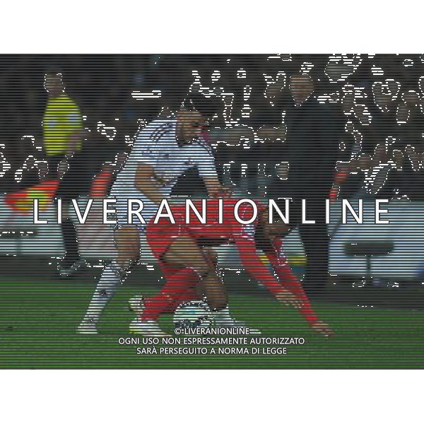 Liverpool\'s Raheem Sterling is fouled by Swansea City\'s Neil Taylor Photographer Kevin Barnes/CameraSport Football - Barclays Premiership - Swansea City v Liverpool - Monday 16th March - The Liberty Stadium - Swansea Â© CameraSport - 43 Linden Ave. Countesthorpe. Leicester. England. LE8 5PG - Tel: +44 (0) 116 277 4147 - admin@camerasport.com - www.camerasport.com AG ALDO LIVERANI SAS ONLY ITALY