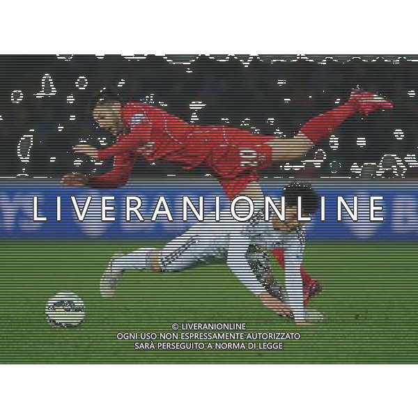 Liverpool\'s Adam Lallana is fouled by Swansea City\'s Ki Sung-Yueng Photographer Kevin Barnes/CameraSport Football - Barclays Premiership - Swansea City v Liverpool - Monday 16th March - The Liberty Stadium - Swansea Â© CameraSport - 43 Linden Ave. Countesthorpe. Leicester. England. LE8 5PG - Tel: +44 (0) 116 277 4147 - admin@camerasport.com - www.camerasport.com AG ALDO LIVERANI SAS ONLY ITALY