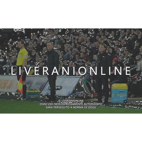 Liverpool manager Brendan Rodgers (right) watches from the touchline as his side win 1-0 Photographer Kevin Barnes/CameraSport Football - Barclays Premiership - Swansea City v Liverpool - Monday 16th March - The Liberty Stadium - Swansea Â© CameraSport - 43 Linden Ave. Countesthorpe. Leicester. England. LE8 5PG - Tel: +44 (0) 116 277 4147 - admin@camerasport.com - www.camerasport.com AG ALDO LIVERANI SAS ONLY ITALY
