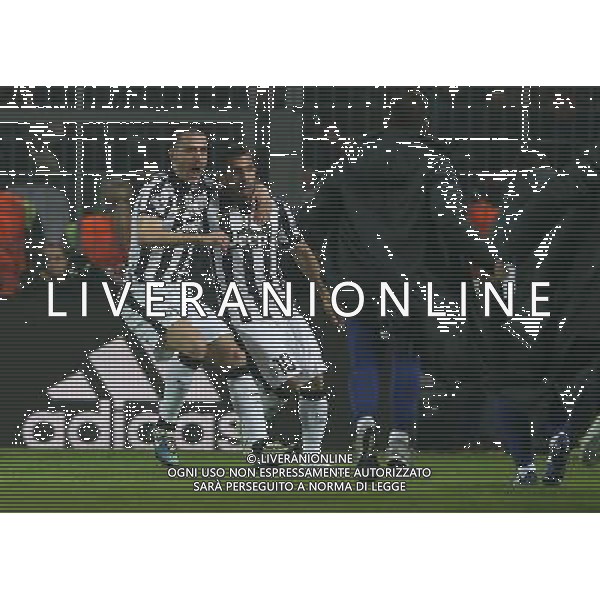 firo Fu§ball,Fussball, 18.03.2015 Uefa Champions League Achtelfinale , Saison 2014/2015 BVB Borussia Dortmund - Juventus Turn esultanza dopo il gol di carlos tevez con leonardo bonucci $worldrightsEs gelten unsere AGB, einsehbar auf www.firosportphoto.de copyright by firo sportphoto: /Agenzia Aldo Liverani sas - ITALY ONLY - EDITORIAL USE ONLY