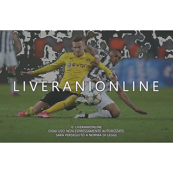 firo Fu§ball,Fussball, 18.03.2015 Uefa Champions League Achtelfinale , Saison 2014/2015 BVB Borussia Dortmund - Juventus Turn marco reus gegen arturo vidal $worldrightsEs gelten unsere AGB, einsehbar auf www.firosportphoto.de copyright by firo sportphoto: /Agenzia Aldo Liverani sas - ITALY ONLY - EDITORIAL USE ONLY