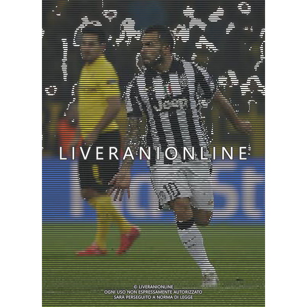 Fu§ball, firo : 18.03.2015 CL, Champions League, Saison 2014/2015, BVB, Borussia Dortmund, Juventus Turin,0:3 Torjubel, Freude, Carlos Tevez, Juventus Turin, ganze Figur, Gestik, Mimik, im Hintergrund Ilkay GUENDOGAN G†NDOGAN, BVB Borussia Dortmund, esultanza $worldrightsEs gelten unsere AGB, einsehbar auf www.firosportphoto.de, copyright by firo sportphoto: /Agenzia Aldo Liverani sas - ITALY ONLY - EDITORIAL USE ONLY