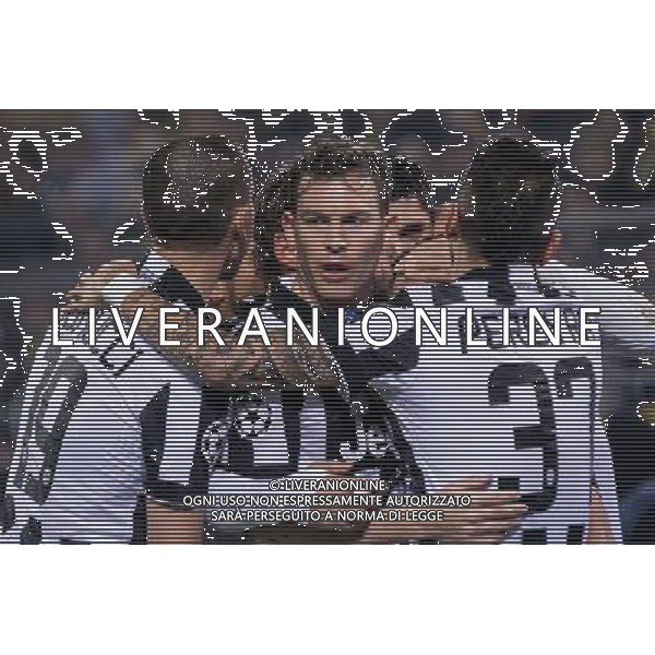 18.03.2015, Dortmund, Signal Iduna Park, Pilka nozna, football, 1/8 Champions League, Liga Mistrzow, BVB - Juve, BVB Borussia Dortmund - Juventus Turyn, Stephan Lichtsteiner (Juventus Turyn), `Roberto Maximiliano Pereyra (Juventus Turyn), Carlos Tevez (Juventus Turyn), bramka, radosc, goal, gol , fot. Lukasz Skwiot / Foto Olimpik / Newspix.pl esultanza Newspix.pl /Agenzia Aldo Liverani sas - ITALY ONLY - EDITORIAL USE ONLY *** Local Caption *** www.newspix.pl mail us: info@newspix.pl call us: 0048 022 23 22 222 --- Polish Picture Agency by Ringier Axel Springer Poland