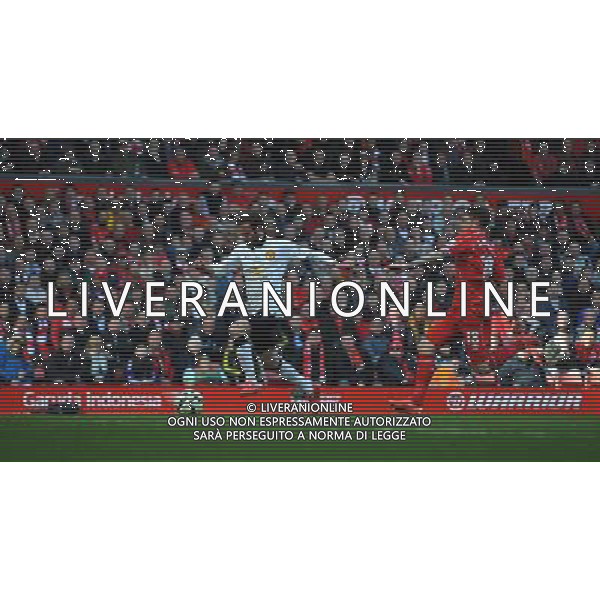 Manchester United\'s Juan Mata beats Liverpool\'s Alberto Moreno before shooting past Liverpool\'s goalkeeper Simon Mignolet for the opening goal of the match Photographer Kevin Barnes/CameraSport Football - Barclays Premiership - Liverpool v Manchester United - Sunday 22nd March - Anfield - Liverpool © CameraSport - 43 Linden Ave. Countesthorpe. Leicester. England. LE8 5PG - Tel: +44 (0) 116 277 4147 - admin@camerasport.com - www.camerasport.com /Agenzia Aldo Liverani sas - ITALY ONLY - EDITORIAL USE ONLY