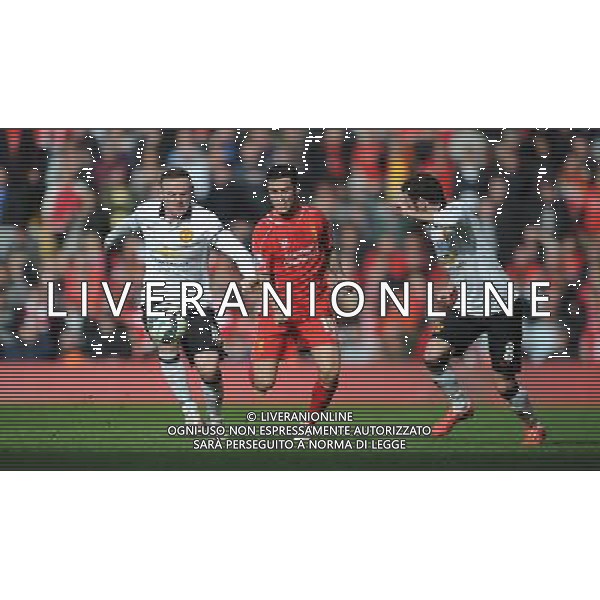 Manchester United\'s Wayne Rooney and Liverpool\'s Philippe Coutinho Photographer Kevin Barnes/CameraSport Football - Barclays Premiership - Liverpool v Manchester United - Sunday 22nd March - Anfield - Liverpool å© CameraSport - 43 Linden Ave. Countesthorpe. Leicester. England. LE8 5PG - Tel: +44 (0) 116 277 4147 - admin@camerasport.com - www.camerasport.com /AGENZIA ALDO LIVERANI SAS - ITALY ONLY - EDITORIAL USE ONLY