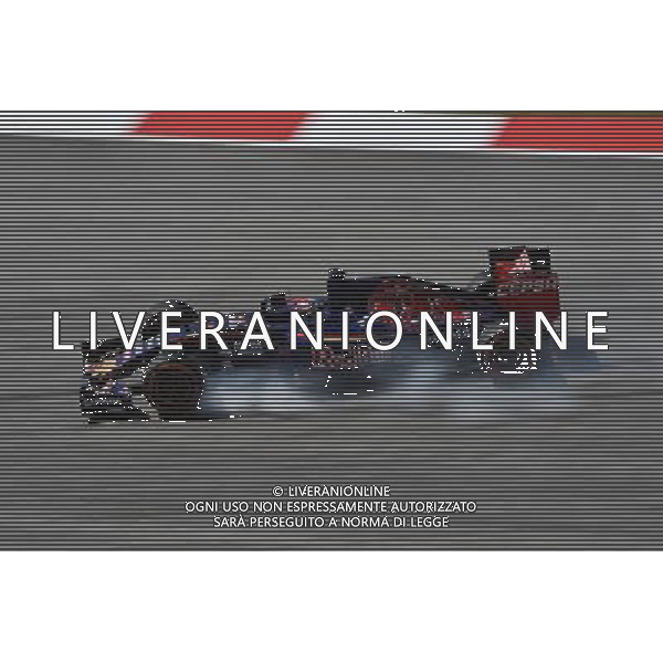 Carlos Sainz Jr (ESP) Scuderia Toro Rosso STR10 locks up under braking. 27.03.2015. Formula 1 World Championship, Rd 2, Malaysian Grand Prix, Sepang, Malaysia, Friday. AG ALDO LIVERANI SAS ONLY ITALY
