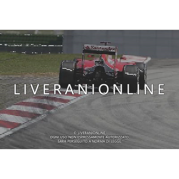 Sebastian Vettel (GER), Scuderia Ferrari 27.03.2015. Formula 1 World Championship, Rd 2, Malaysian Grand Prix, Sepang, Malaysia, Friday. - www.xpbimages.com, EMail: requests@xpbimages.com - copy of publication required for printed pictures. Every used picture is fee-liable. © Copyright: Charniaux / XPB Images Agenzia Aldo Liverani s.a.s/ONLY ITALY