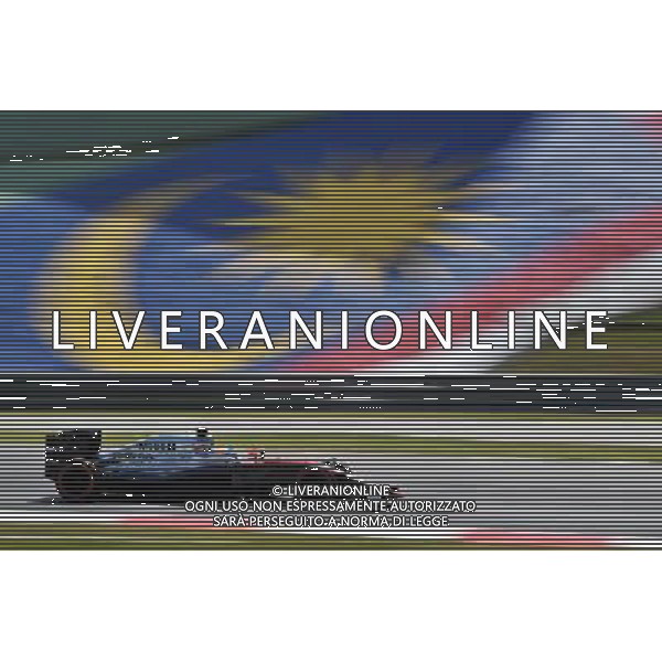 Fernando Alonso (ESP) McLaren MP4-30. 27.03.2015. Formula 1 World Championship, Rd 2, Malaysian Grand Prix, Sepang, Malaysia, Friday. - www.xpbimages.com, EMail: requests@xpbimages.com - copy of publication required for printed pictures. Every used picture is fee-liable. © Copyright: Price / XPB Images Agenzia Aldo Liverani s.a.s/ONLY ITALY