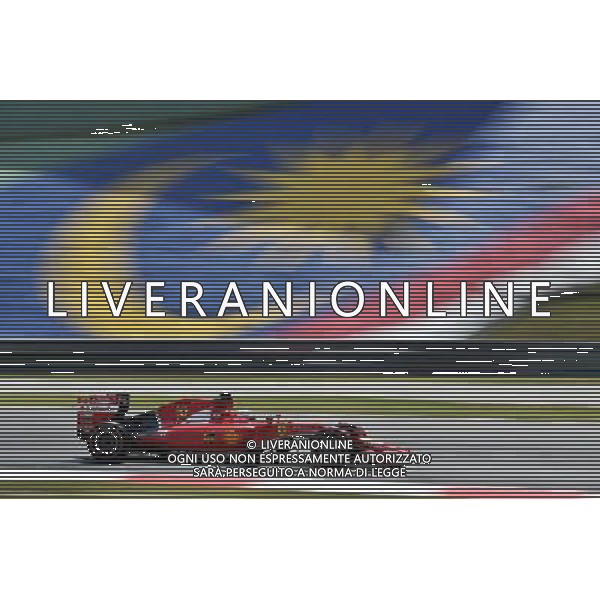 Sebastian Vettel (GER) Ferrari SF15-T. 27.03.2015. Formula 1 World Championship, Rd 2, Malaysian Grand Prix, Sepang, Malaysia, Friday. - www.xpbimages.com, EMail: requests@xpbimages.com - copy of publication required for printed pictures. Every used picture is fee-liable. © Copyright: Price / XPB Images Agenzia Aldo Liverani s.a.s/ONLY ITALY