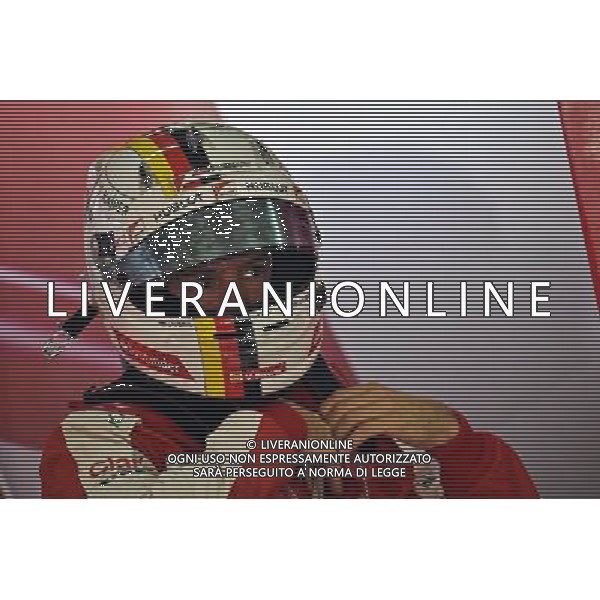 Sebastian Vettel (GER) Ferrari. 27.03.2015. Formula 1 World Championship, Rd 2, Malaysian Grand Prix, Sepang, Malaysia, Friday. - www.xpbimages.com, EMail: requests@xpbimages.com - copy of publication required for printed pictures. Every used picture is fee-liable. © Copyright: Price / XPB Images Agenzia Aldo Liverani s.a.s/ONLY ITALY