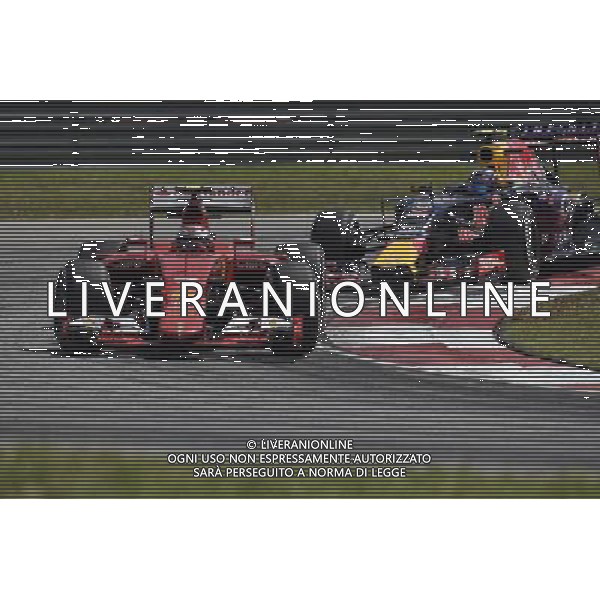 Kimi Raikkonen (FIN) Ferrari SF15-T leads Daniil Kvyat (RUS) Red Bull Racing RB11. 27.03.2015. Formula 1 World Championship, Rd 2, Malaysian Grand Prix, Sepang, Malaysia, Friday. - www.xpbimages.com, EMail: requests@xpbimages.com - copy of publication required for printed pictures. Every used picture is fee-liable. © Copyright: Price / XPB Images Agenzia Aldo Liverani s.a.s/ONLY ITALY