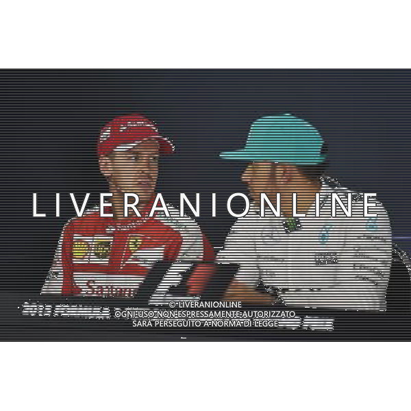 (L to R): Sebastian Vettel (GER) Ferrari and Lewis Hamilton (GBR) Mercedes AMG F1 in the FIA Press Conference. 28.03.2015. Formula 1 World Championship, Rd 2, Malaysian Grand Prix, Sepang, Malaysia, Saturday. - www.xpbimages.com, EMail: requests@xpbimages.com - copy of publication required for printed pictures. Every used picture is fee-liable. Â© Copyright: Price / XPB Images/ONLY ITALY/Agenzia Aldo Liverani s.a.s.