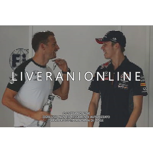 (L to R): Jenson Button (GBR) McLaren with Daniil Kvyat (RUS) Red Bull Racing on the drivers parade. 29.03.2015. Formula 1 World Championship, Rd 2, Malaysian Grand Prix, Sepang, Malaysia, Sunday. /AGENZIA ALDO LIVERANI SAS - ITALY ONLY - EDITORIAL USE ONLY - GP F1 MALESIA GARA 29 MARZO 2015