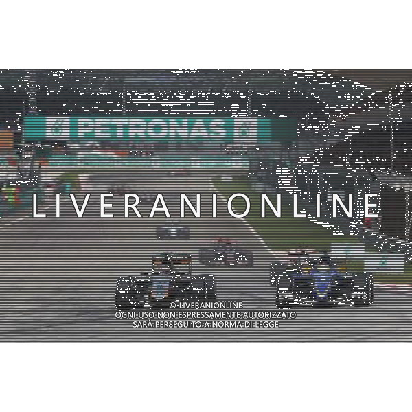 (L to R): Nico Hulkenberg (GER) Sahara Force India F1 VJM08 and Marcus Ericsson (SWE) Sauber C34 battle for position. 29.03.2015. Formula 1 World Championship, Rd 2, Malaysian Grand Prix, Sepang, Malaysia, Sunday. /AGENZIA ALDO LIVERANI SAS - ITALY ONLY - EDITORIAL USE ONLY - GP F1 MALESIA GARA 29 MARZO 2015