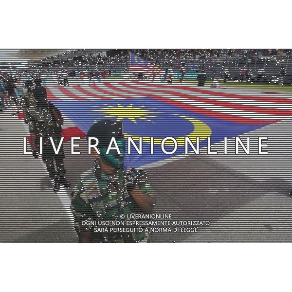 The Malaysian flag on the grid. 29.03.2015. Formula 1 World Championship, Rd 2, Malaysian Grand Prix, Sepang, Malaysia, Sunday. /AGENZIA ALDO LIVERANI SAS - ITALY ONLY - EDITORIAL USE ONLY - GP F1 MALESIA GARA 29 MARZO 2015