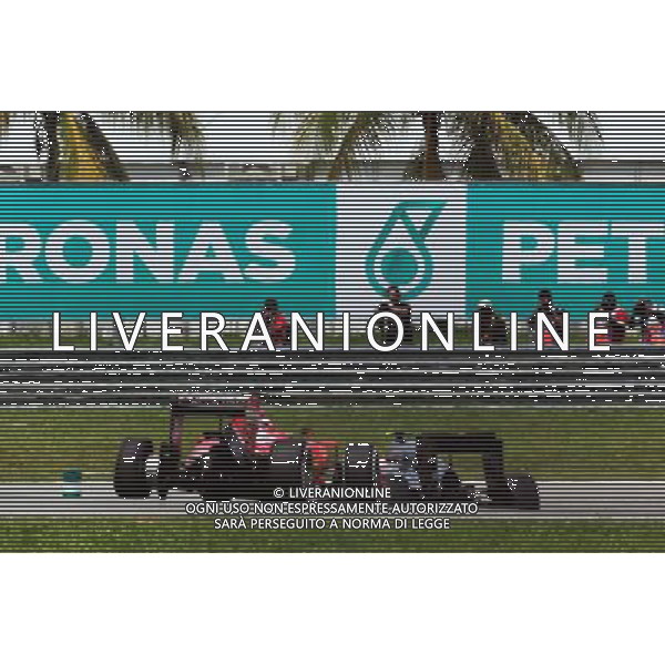 Kimi Raikkonen (FIN) Ferrari SF15-T with a puncture. 29.03.2015. Formula 1 World Championship, Rd 2, Malaysian Grand Prix, Sepang, Malaysia, Sunday. /AGENZIA ALDO LIVERANI SAS - ITALY ONLY - EDITORIAL USE ONLY - GP F1 MALESIA GARA 29 MARZO 2015