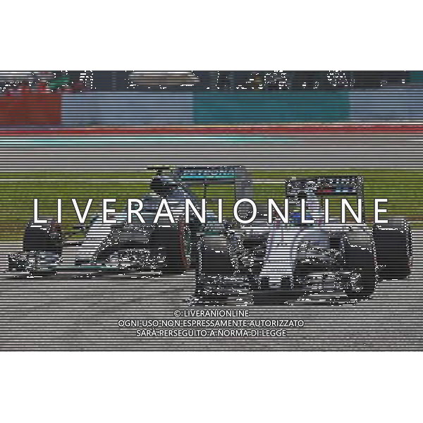 Felipe Massa (BRA) Williams FW37 leads Nico Rosberg (GER) Mercedes AMG F1 W06. 29.03.2015. Formula 1 World Championship, Rd 2, Malaysian Grand Prix, Sepang, Malaysia, Sunday. /AGENZIA ALDO LIVERANI SAS - ITALY ONLY - EDITORIAL USE ONLY