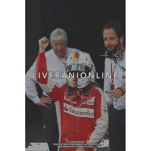 Race winner Sebastian Vettel (GER) Ferrari celebrates in parc ferme. 29.03.2015. Formula 1 World Championship, Rd 2, Malaysian Grand Prix, Sepang, Malaysia, Sunday. /AGENZIA ALDO LIVERANI SAS - ITALY ONLY - EDITORIAL USE ONLY