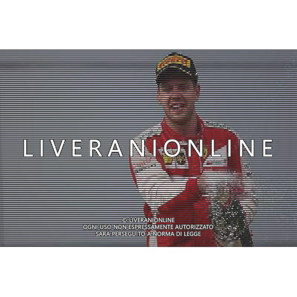 1st place Sebastian Vettel (GER) Ferrari. 29.03.2015. Formula 1 World Championship, Rd 2, Malaysian Grand Prix, Sepang, Malaysia, Sunday. /AGENZIA ALDO LIVERANI SAS - ITALY ONLY - EDITORIAL USE ONLY