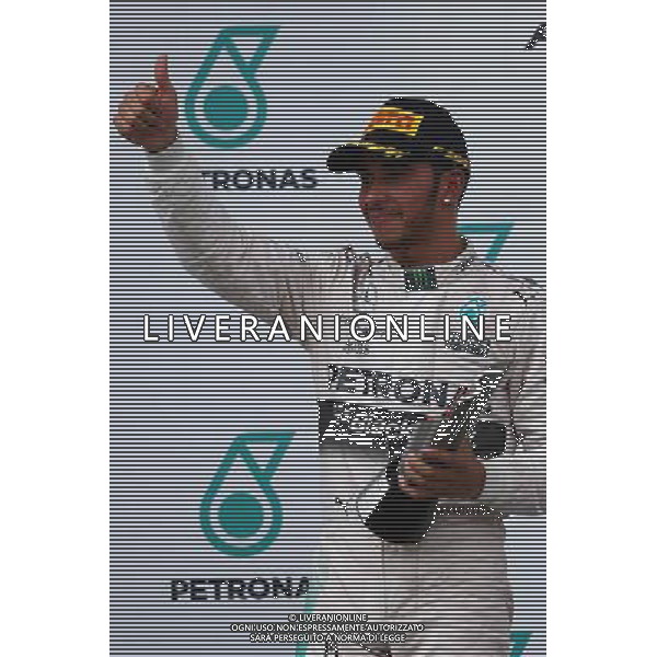 2nd place Lewis Hamilton (GBR) Mercedes AMG F1. 29.03.2015. Formula 1 World Championship, Rd 2, Malaysian Grand Prix, Sepang, Malaysia, Sunday. /AGENZIA ALDO LIVERANI SAS - ITALY ONLY - EDITORIAL USE ONLY