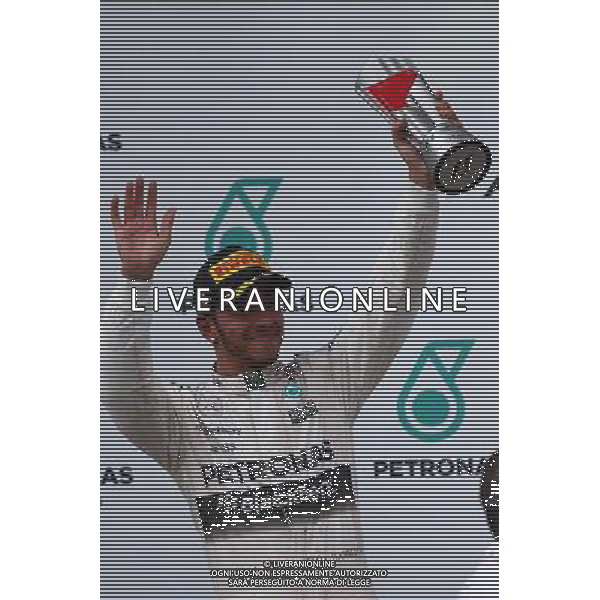2nd place Lewis Hamilton (GBR) Mercedes AMG F1. 29.03.2015. Formula 1 World Championship, Rd 2, Malaysian Grand Prix, Sepang, Malaysia, Sunday. /AGENZIA ALDO LIVERANI SAS - ITALY ONLY - EDITORIAL USE ONLY