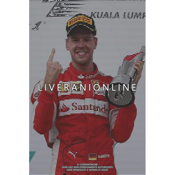1st place Sebastian Vettel (GER) Ferrari. 29.03.2015. Formula 1 World Championship, Rd 2, Malaysian Grand Prix, Sepang, Malaysia, Sunday. /AGENZIA ALDO LIVERANI SAS - ITALY ONLY - EDITORIAL USE ONLY