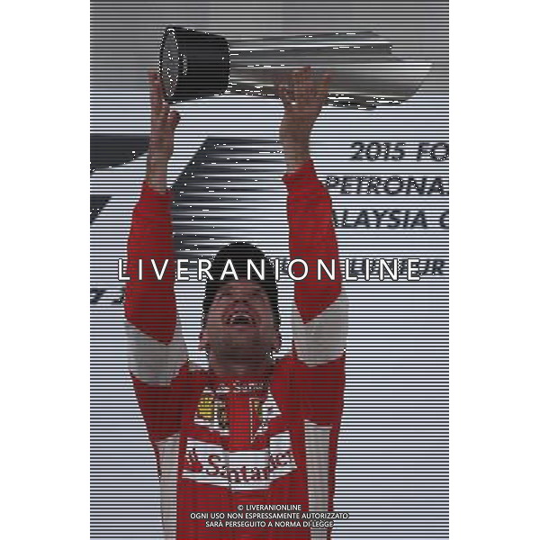 1st place Sebastian Vettel (GER) Ferrari. 29.03.2015. Formula 1 World Championship, Rd 2, Malaysian Grand Prix, Sepang, Malaysia, Sunday. /AGENZIA ALDO LIVERANI SAS - ITALY ONLY - EDITORIAL USE ONLY