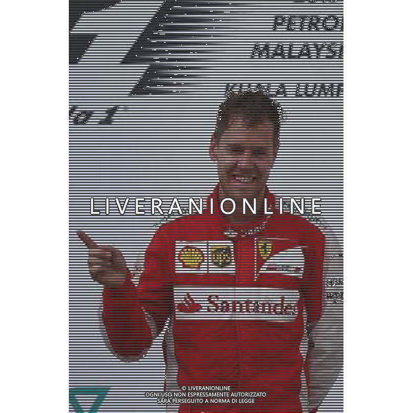 1st place Sebastian Vettel (GER) Ferrari. 29.03.2015. Formula 1 World Championship, Rd 2, Malaysian Grand Prix, Sepang, Malaysia, Sunday. /AGENZIA ALDO LIVERANI SAS - ITALY ONLY - EDITORIAL USE ONLY